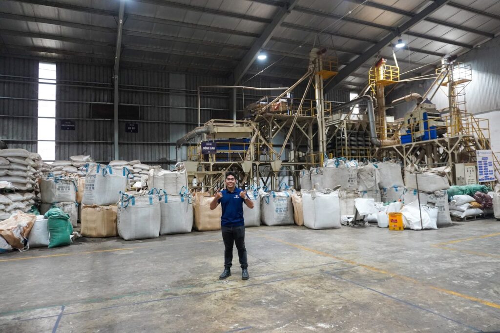 Liam Phan in a pepper warehouse