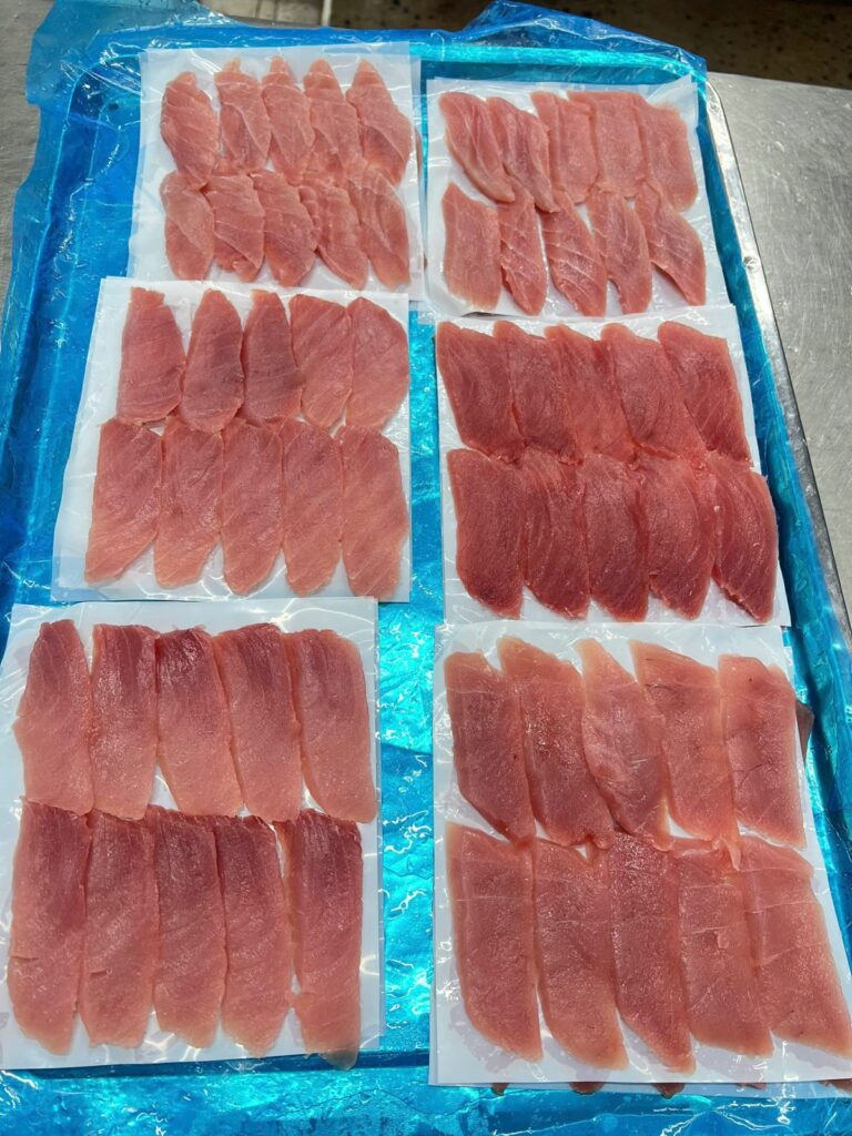 Sashimi slices ready for packing